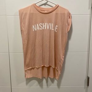 “Nashville” high to low muscle tee with rolled sleeves detail. Worn once